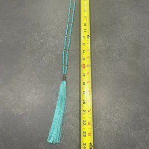 Turquoise and gold beaded necklace with tassel